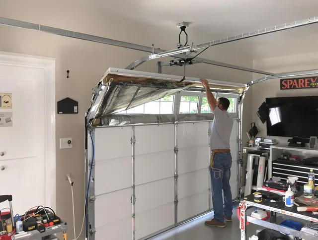 Garage door section replacement by Bell Garage Door Repair in Bell