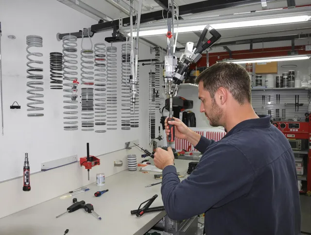 Bell Garage Door Repair safety certified technician performing precision spring replacement in Bell